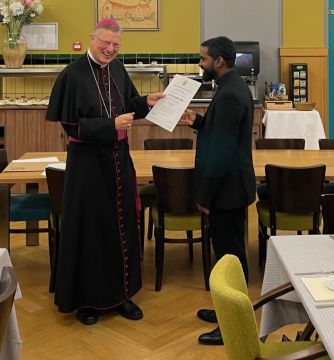 Uitreiking diploma aan Stefan Doss